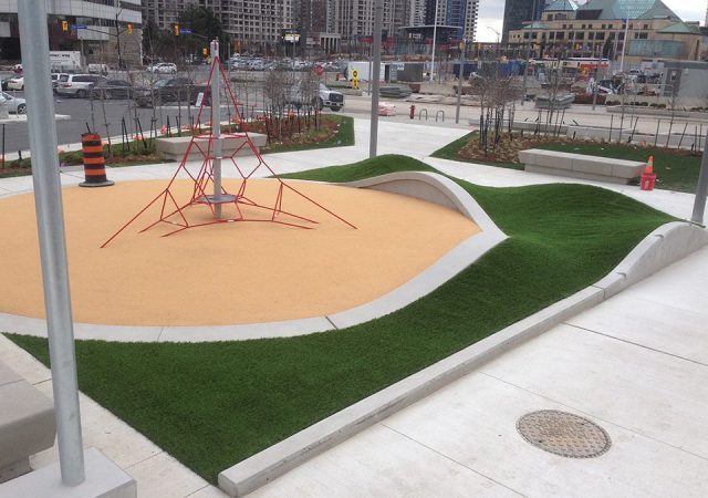 Articial-grass-curved-mounds-playground-960x750-1